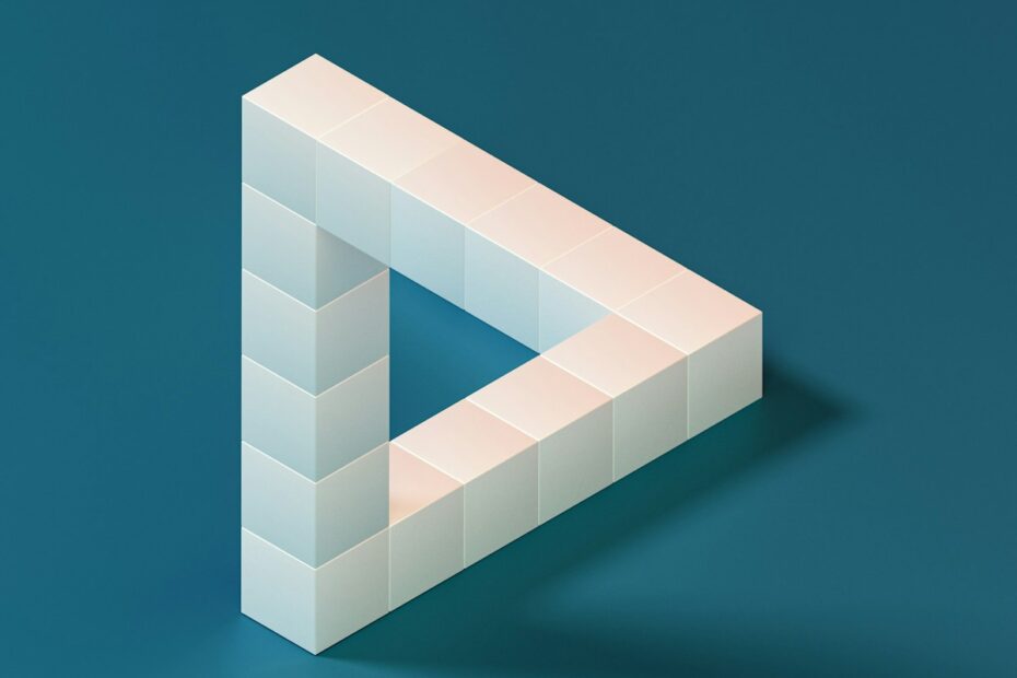 a white object on a blue background with a shadow